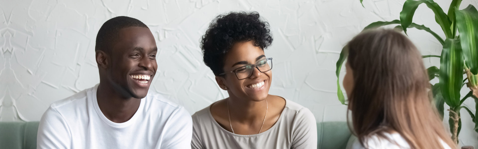 couple sitting together talking to the therapist